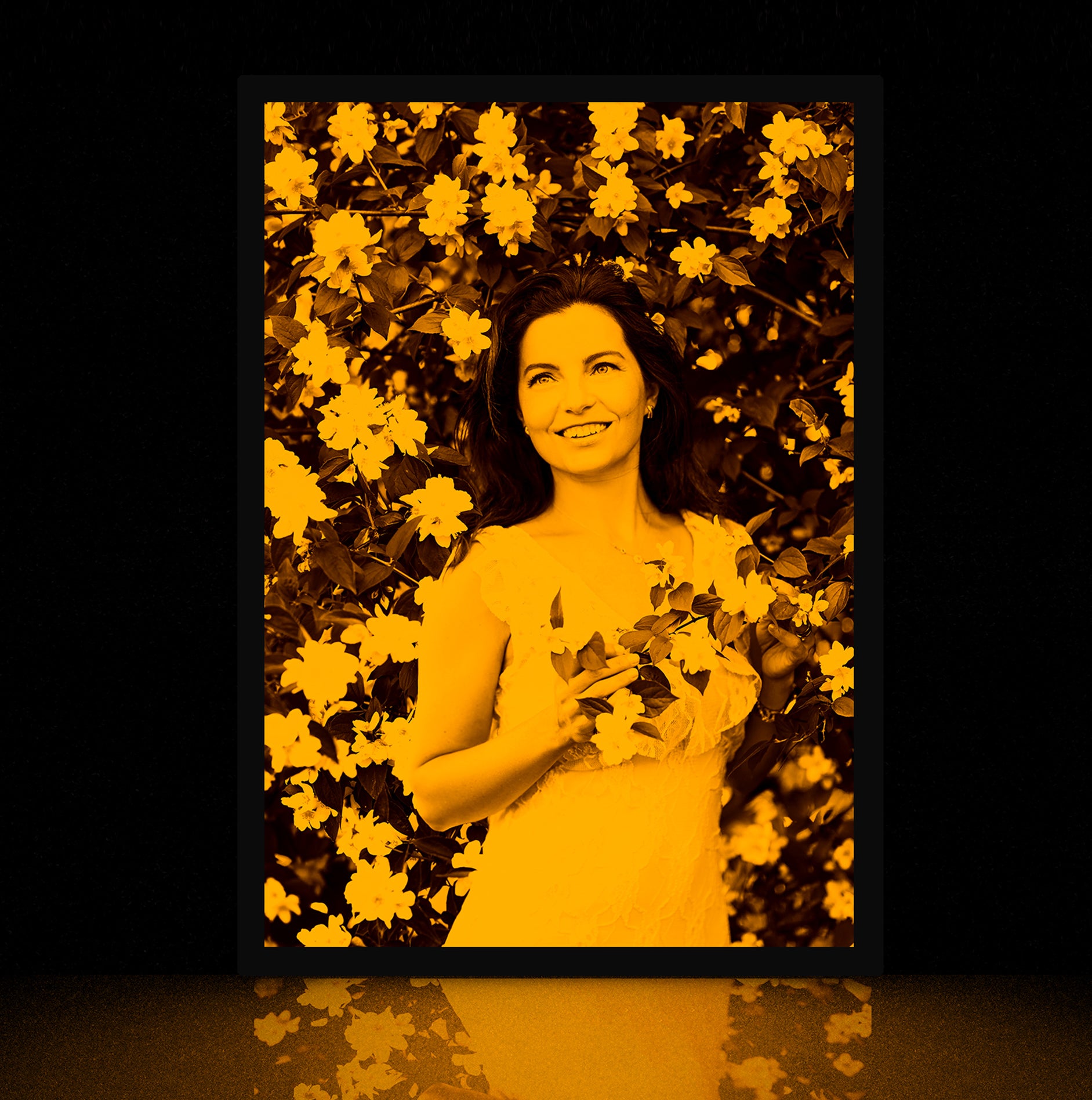 Personalized photo glowing in the dark with a yellow glow.